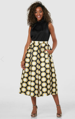 Gold 2-in-1 dress with black top and geometric print